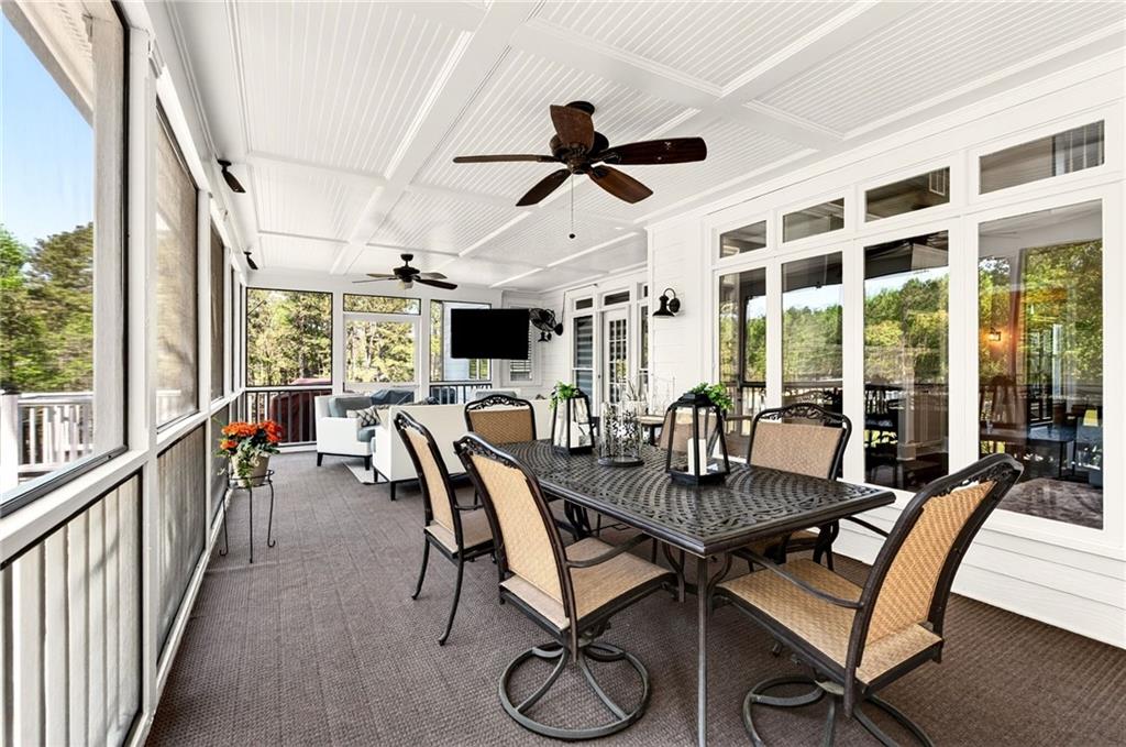565 Old Lathemtown Road Canton, GA 30115 - Photo 31 of 73 a view of a dining room with furniture window and wooden floor