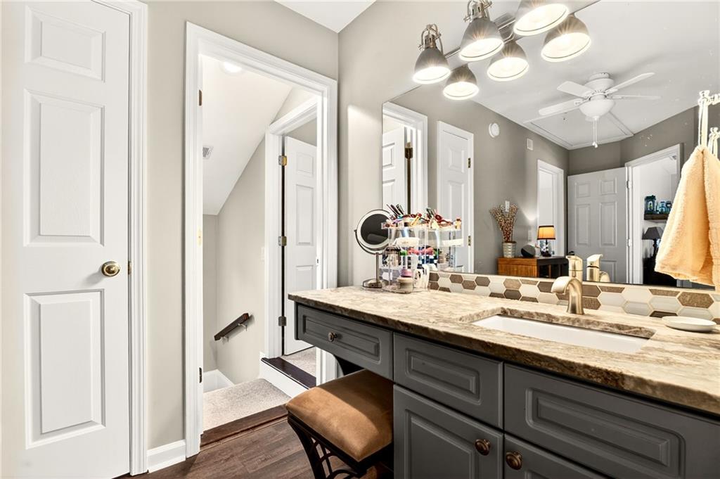 565 Old Lathemtown Road Canton, GA 30115 - Photo 38 of 73 a bathroom with a sink double vanity and a mirror