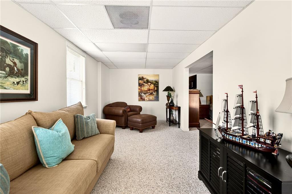 565 Old Lathemtown Road Canton, GA 30115 - Photo 50 of 73 a bed room with furniture and a couch