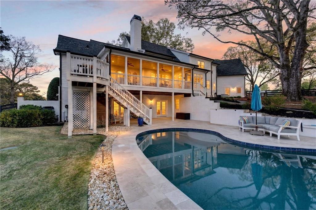 565 Old Lathemtown Road Canton, GA 30115 - Photo 54 of 73 a front view of a house with swimming pool having outdoor seating