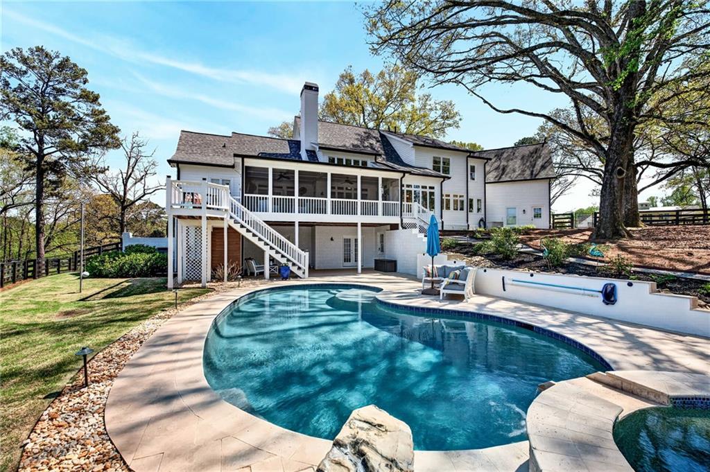 565 Old Lathemtown Road Canton, GA 30115 - Photo 55 of 73 a view of a swimming pool with a patio