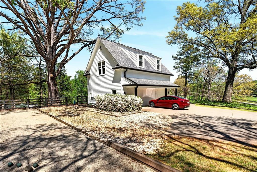 565 Old Lathemtown Road Canton, GA 30115 - Photo 61 of 73 a house that has a tree in front of the house