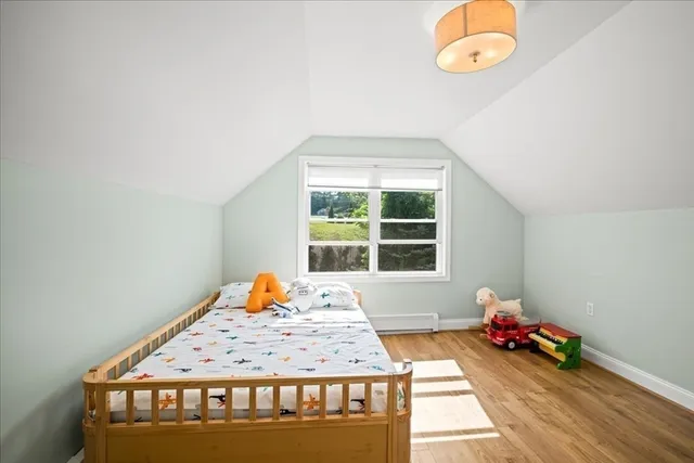 a sitting area with furniture and next to a window