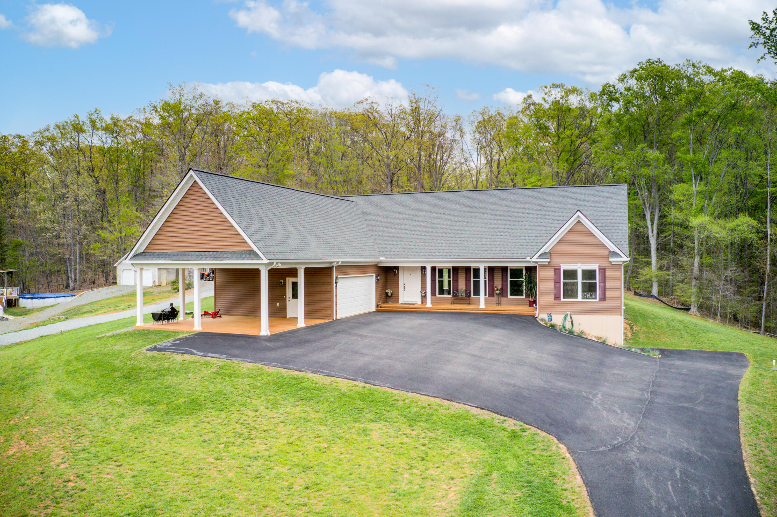 front view of a house with a yard