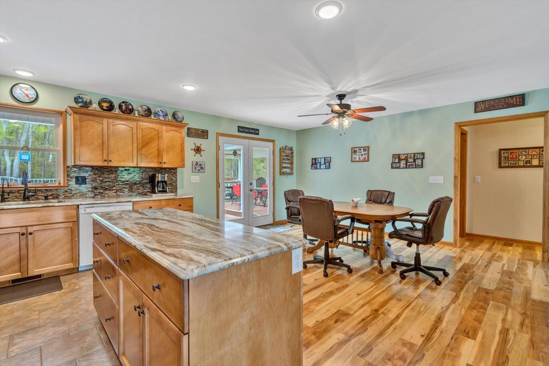 6 Highland Lake Road Union Hall, VA 24176 - Photo 13 of 56 a view of a dining room with furniture and wooden floor