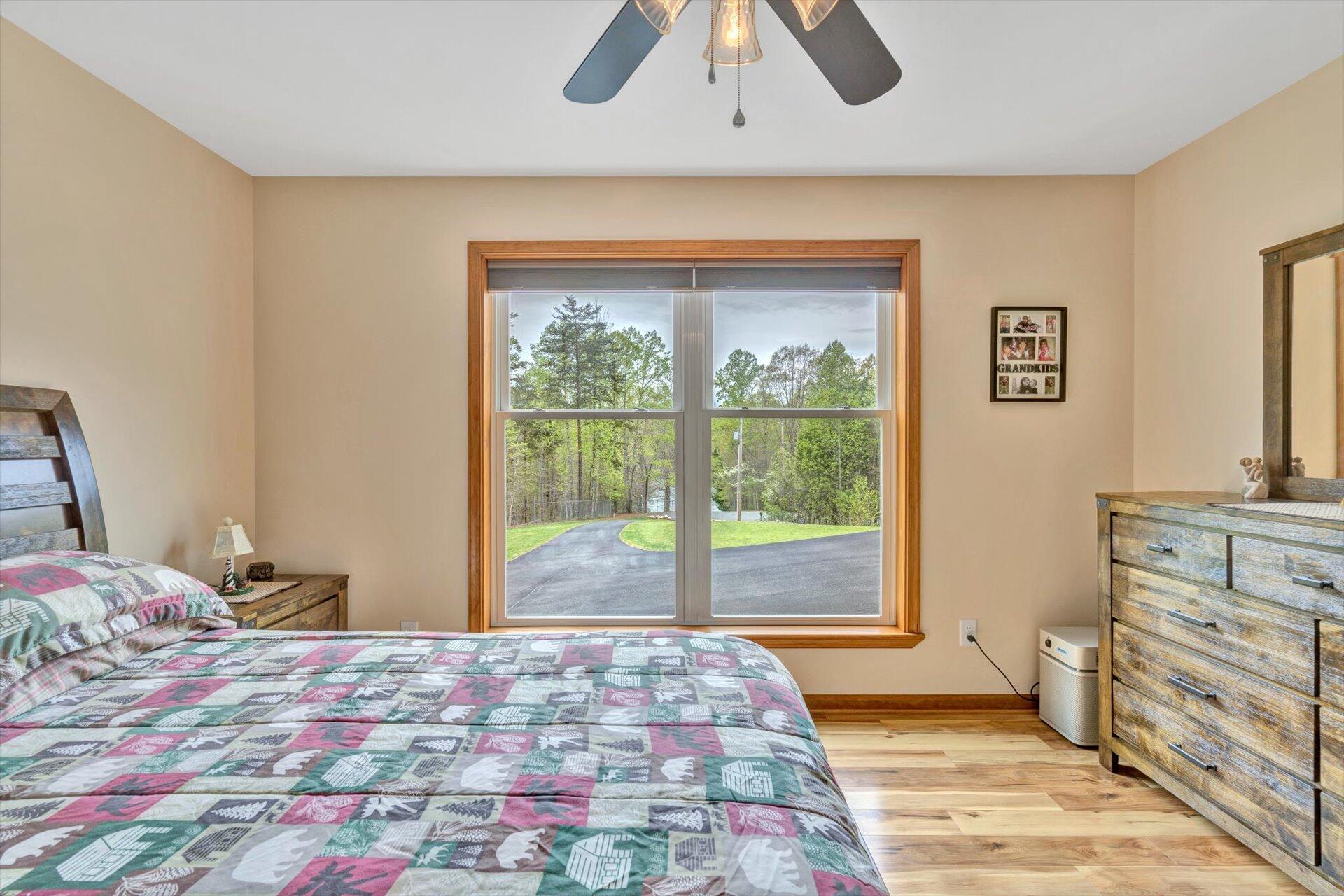 6 Highland Lake Road Union Hall, VA 24176 - Photo 23 of 56 a bedroom with a bed and a window