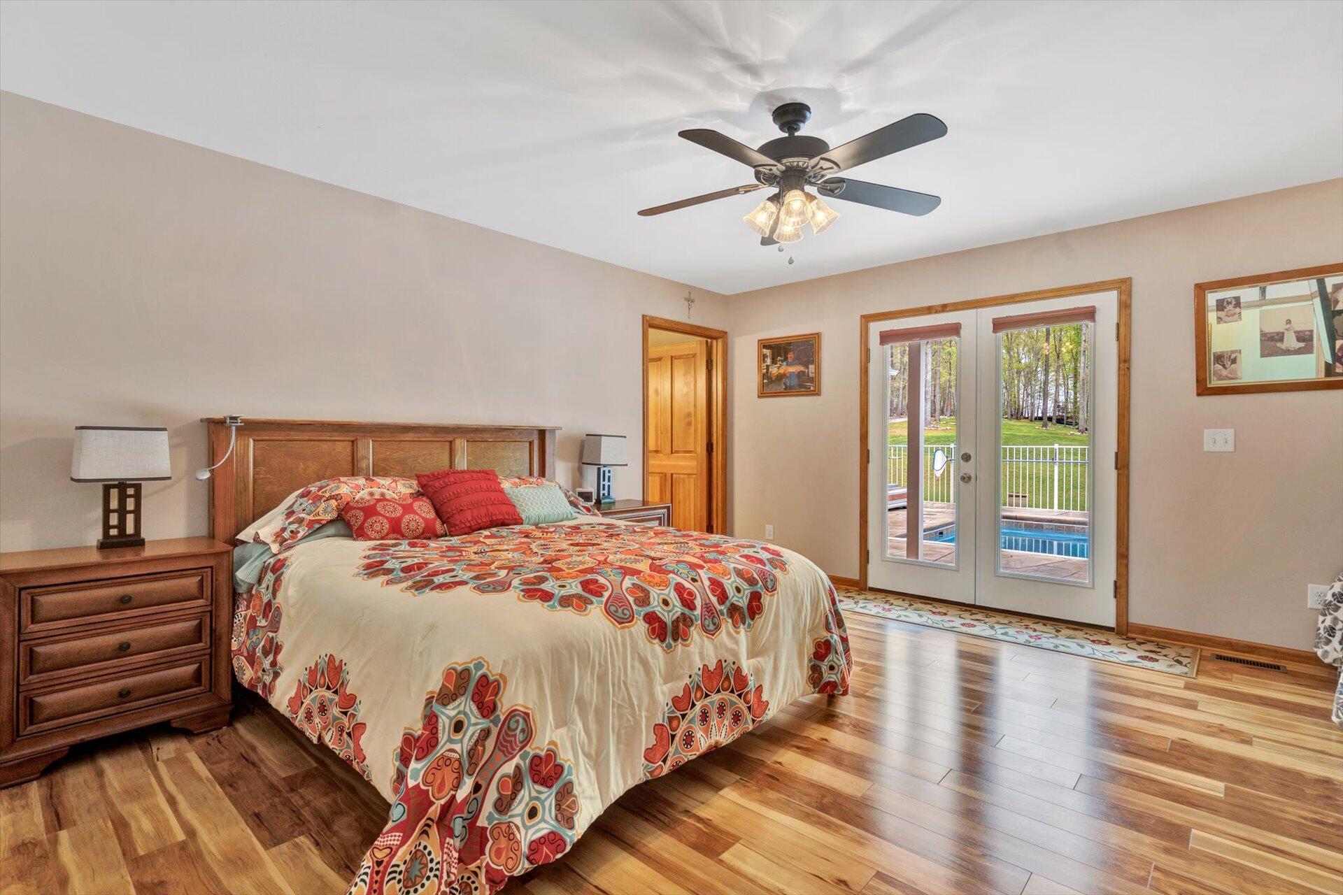 6 Highland Lake Road Union Hall, VA 24176 - Photo 24 of 56 a bedroom with a large bed and a window