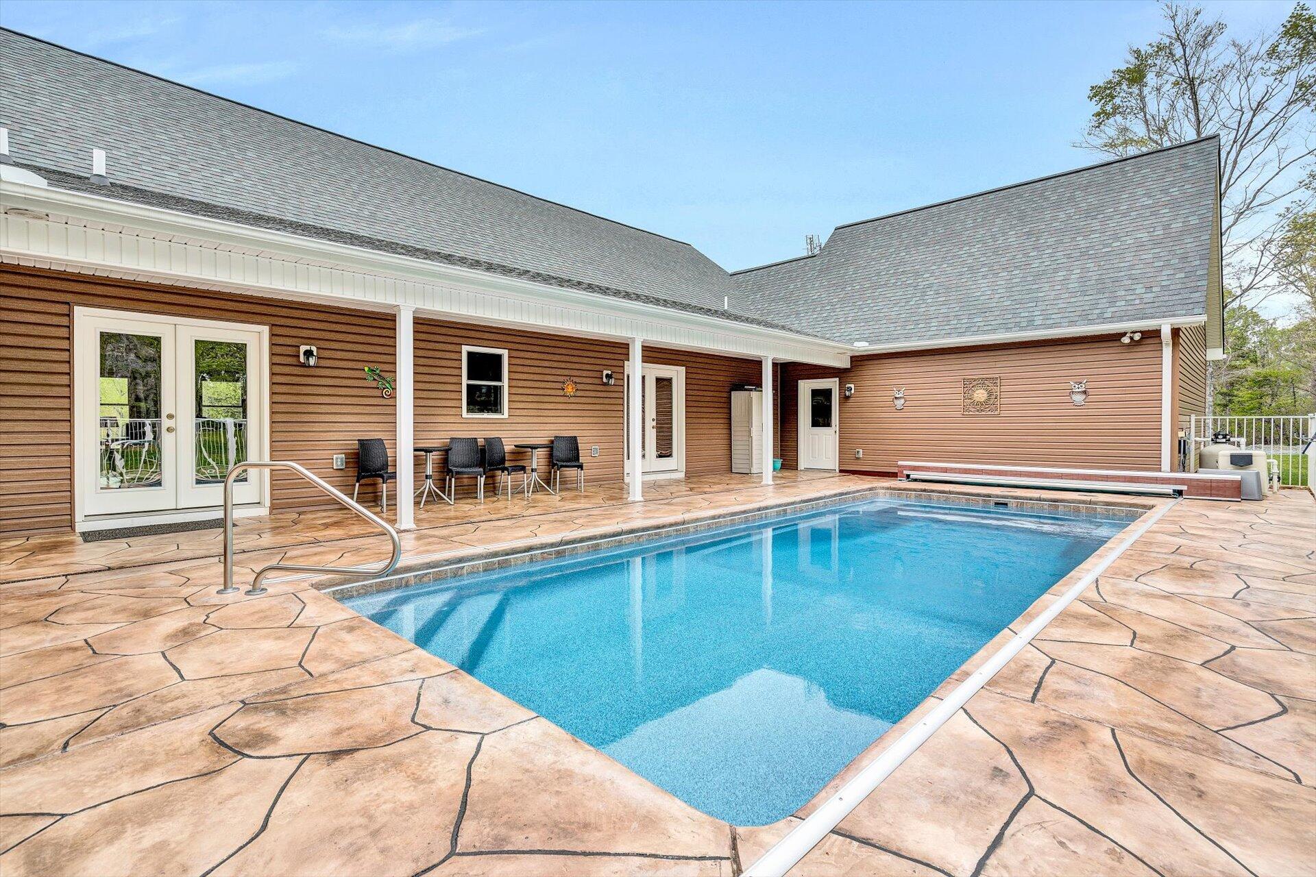 6 Highland Lake Road Union Hall, VA 24176 - Photo 39 of 56 a swimming pool with outdoor seating