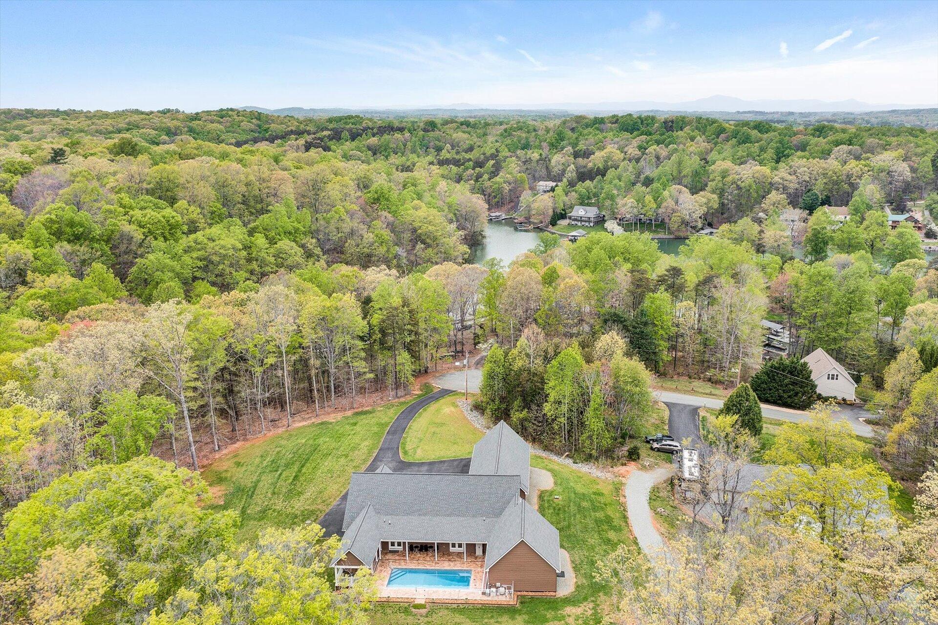 6 Highland Lake Road Union Hall, VA 24176 - Photo 5 of 56 an aerial view of residential houses with outdoor space and trees