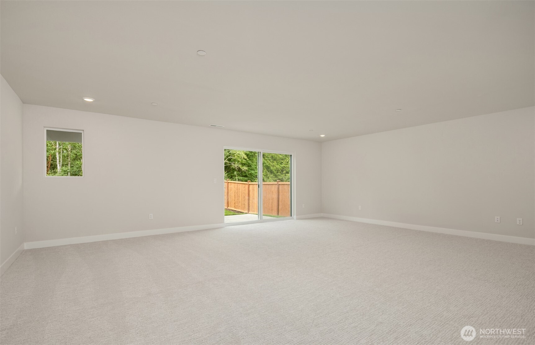 23277 Arbors Ter Road Northeast, Unit 16 Kingston, WA 98346 - Photo 14 of 20 an empty room with windows