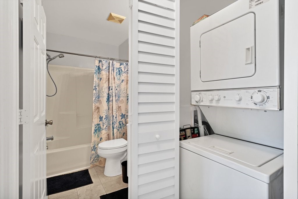 9637 Riverside Drive, Unit 3 Sebastian, FL 32958 - Photo 22 of 36 a bathroom with a sink a toilet and a shower