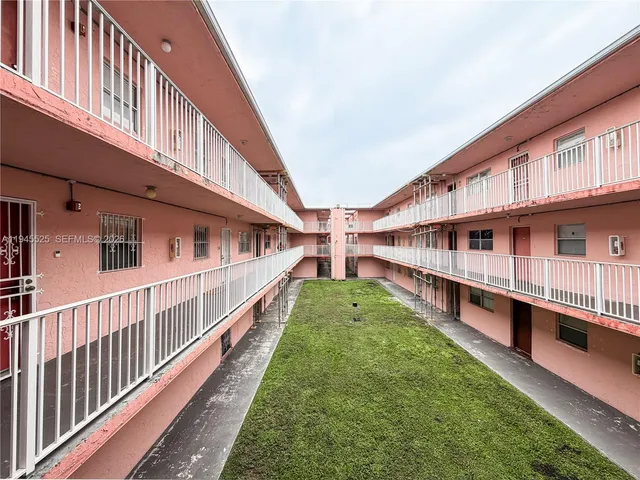 a view of a house with a roof deck