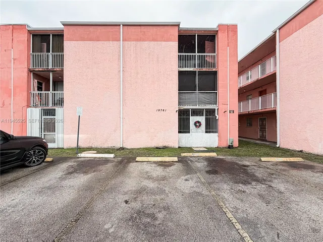 a car parked in front of a building