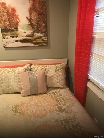 a view of a bed in a bathroom