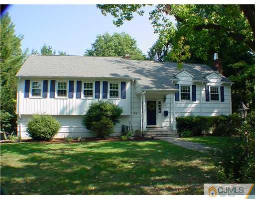 39 Clive Hills Road Edison, NJ 08820 - Photo 1 of 10 a front view of a house with a yard