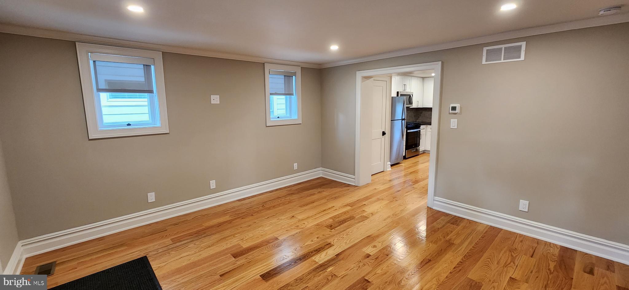 173 Washington Street Doylestown, PA 18901 - Photo 7 of 17 a view of empty room with wooden floor