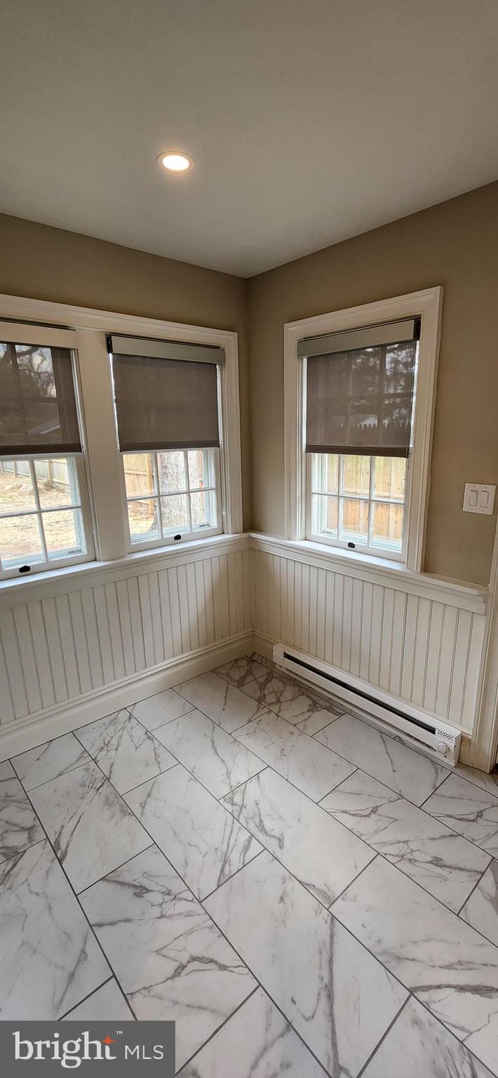 173 Washington Street Doylestown, PA 18901 - Photo 10 of 17 an empty room with windows