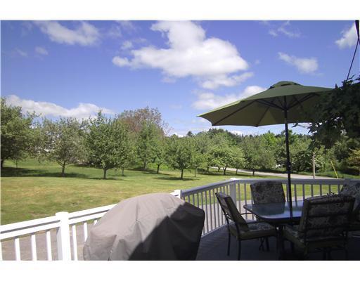 368 Belgrade Road Oakland, ME 04963 - Photo 6 of 24 Patio/Deck. Deck overlooking apple...