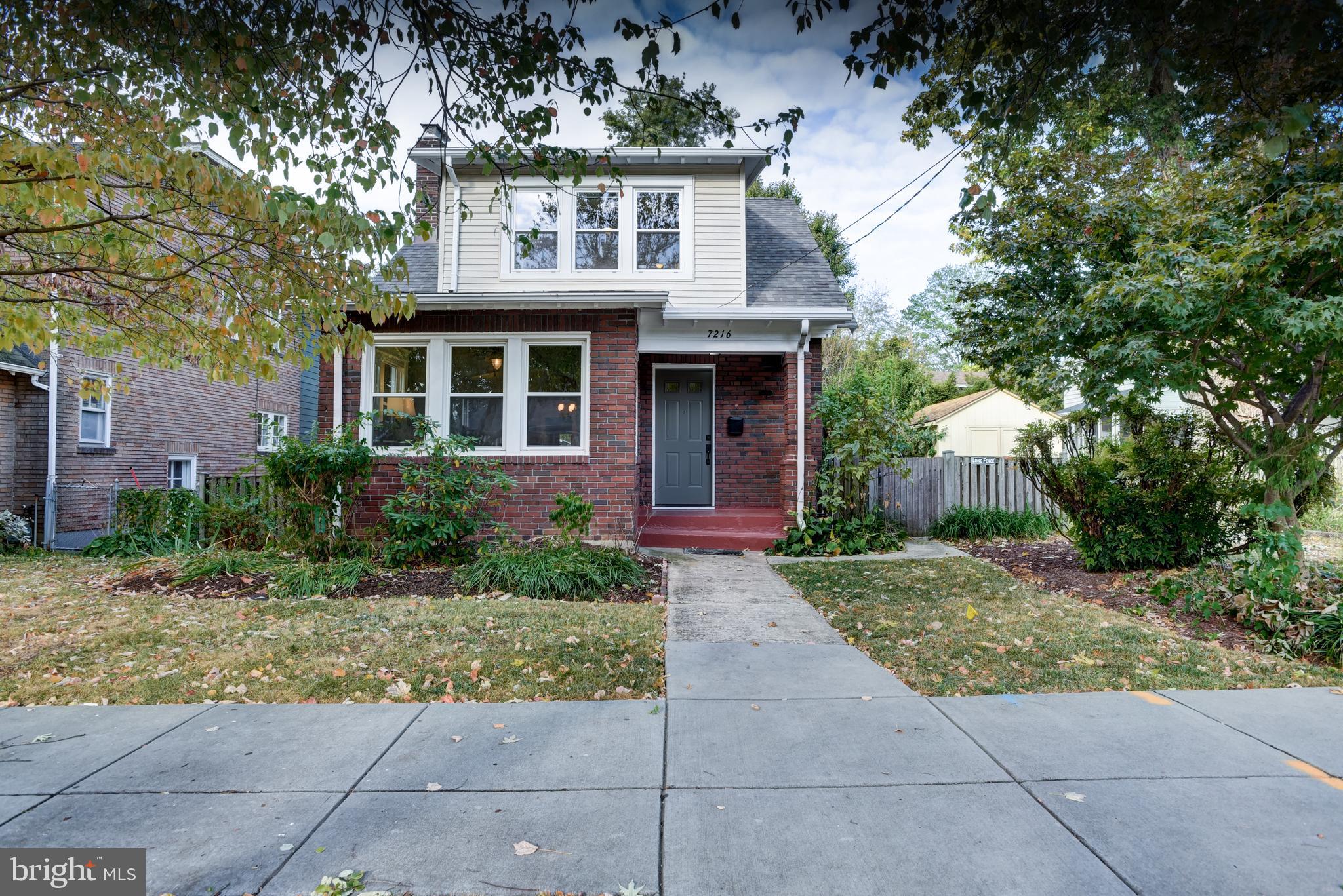 7216 7th Street Northwest Washington, DC 20012 - Photo 1 of 26 a front view of a house with garden