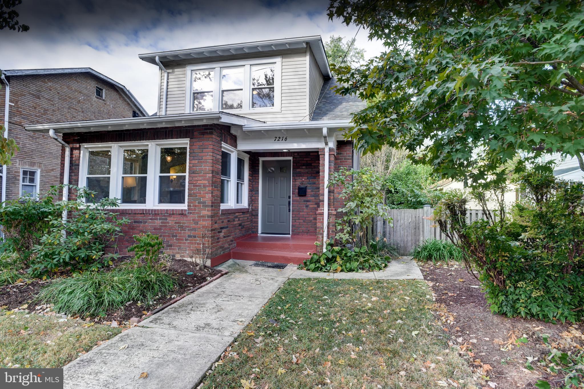 7216 7th Street Northwest Washington, DC 20012 - Photo 2 of 26 a front view of a house with garden and porch