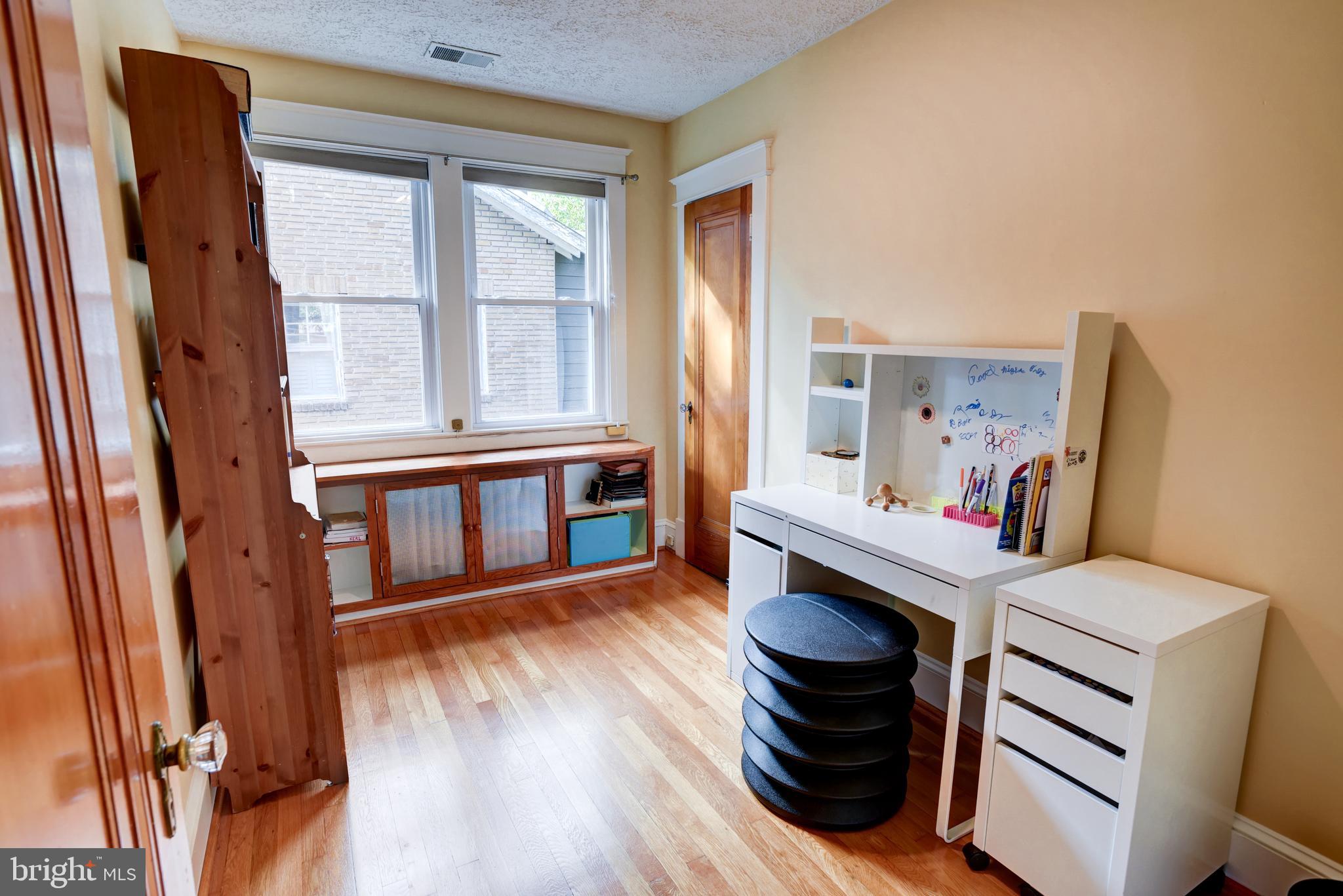 7216 7th Street Northwest Washington, DC 20012 - Photo 15 of 26 a living room with furniture and a wooden floor