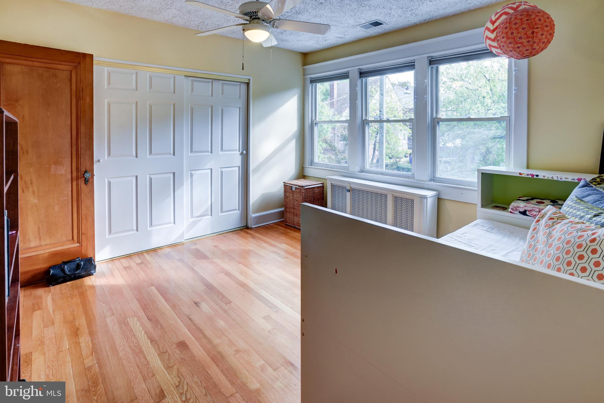 7216 7th Street Northwest Washington, DC 20012 - Photo 16 of 26 wooden floor in an empty room with a window