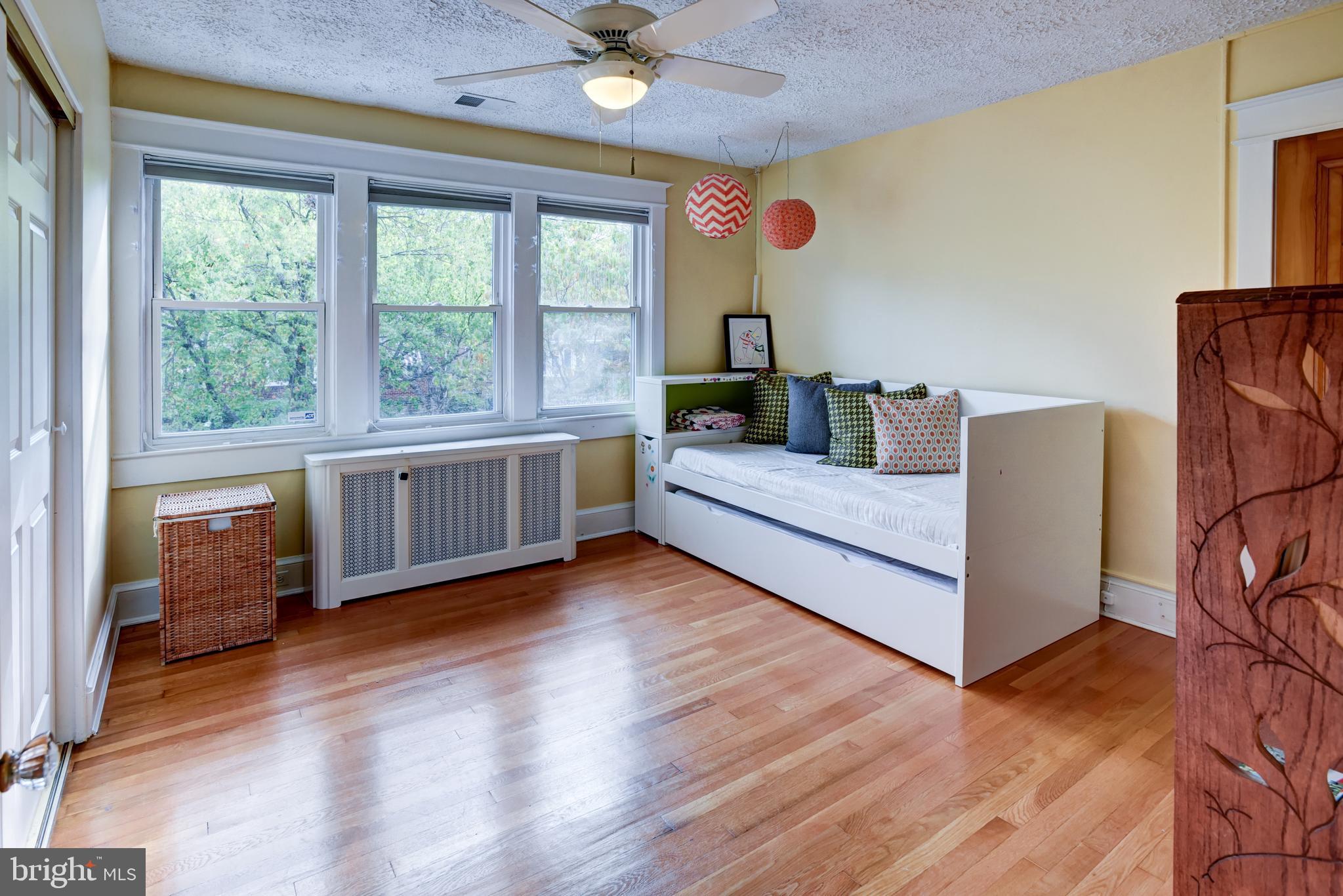 7216 7th Street Northwest Washington, DC 20012 - Photo 17 of 26 a living room with furniture and a large window