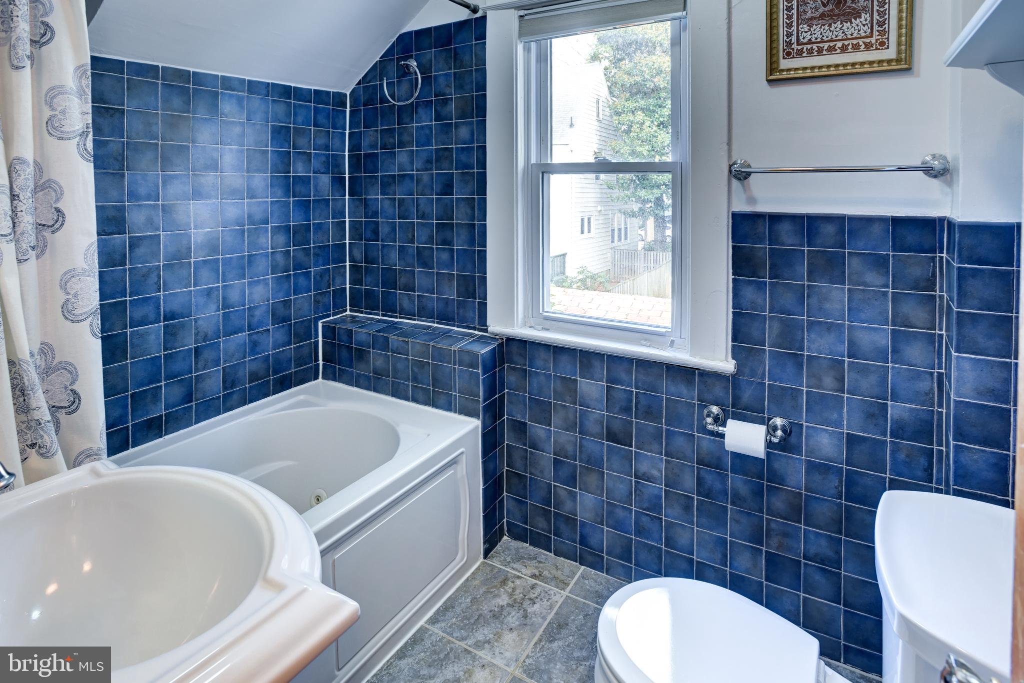 7216 7th Street Northwest Washington, DC 20012 - Photo 18 of 26 a bathroom with a sink and bathtub