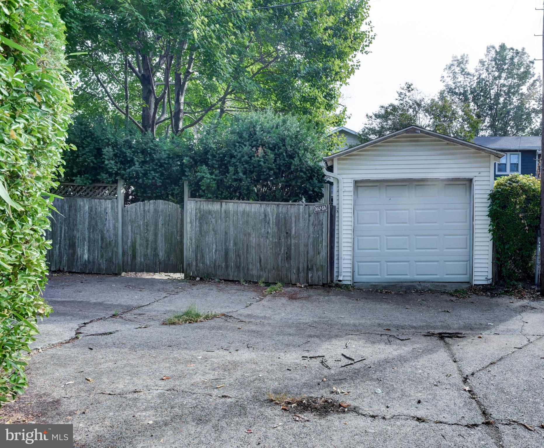 7216 7th Street Northwest Washington, DC 20012 - Photo 25 of 26 a backyard of a house with plants and tree