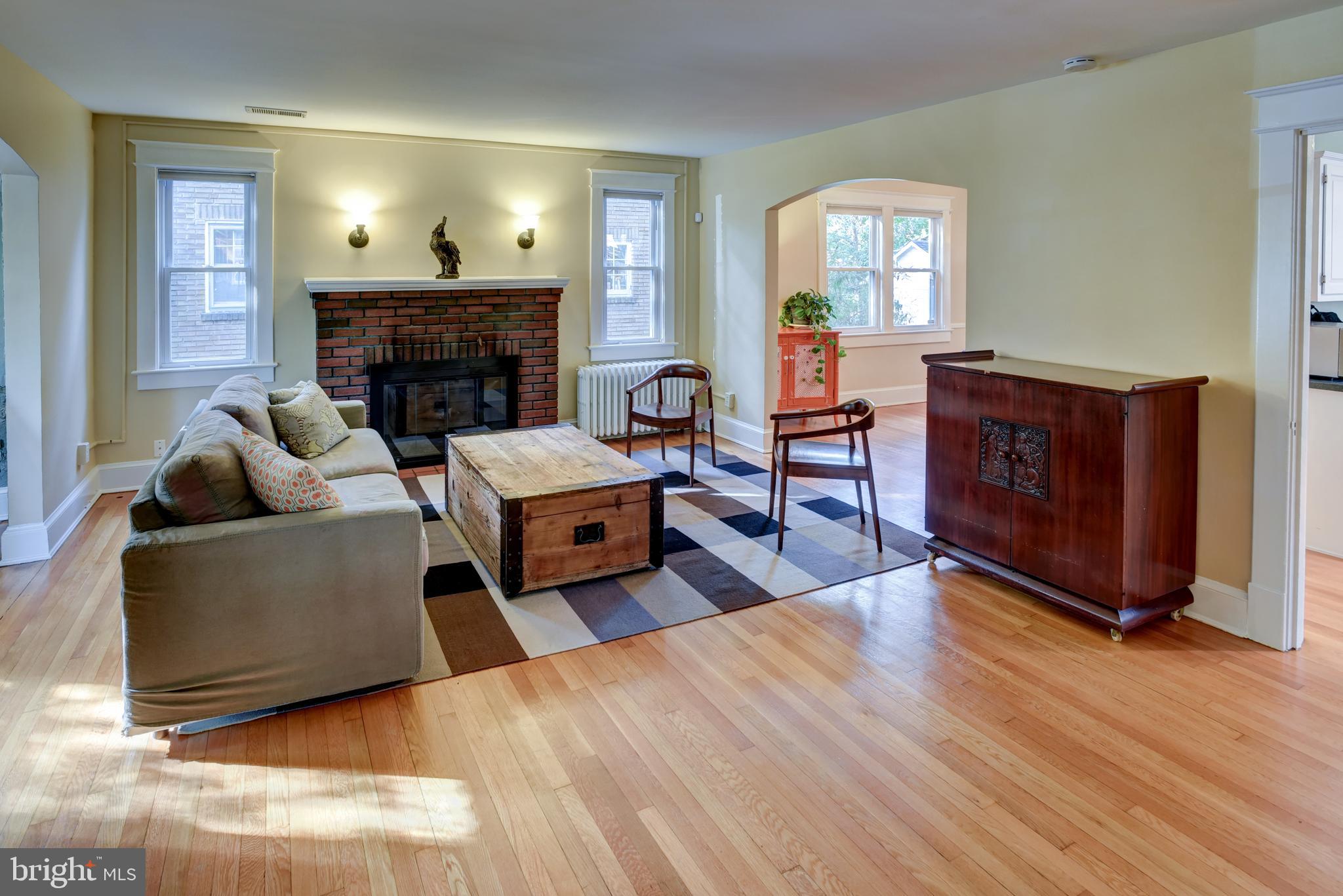 7216 7th Street Northwest Washington, DC 20012 - Photo 4 of 26 a living room with furniture and a fireplace