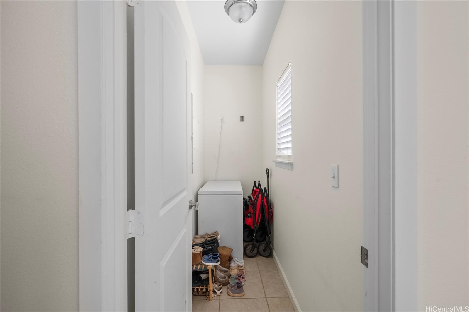 87-176 Maipalaoa Road, Unit D12 Waianae, HI 96792 - Photo 13 of 25 a room with storage and utility