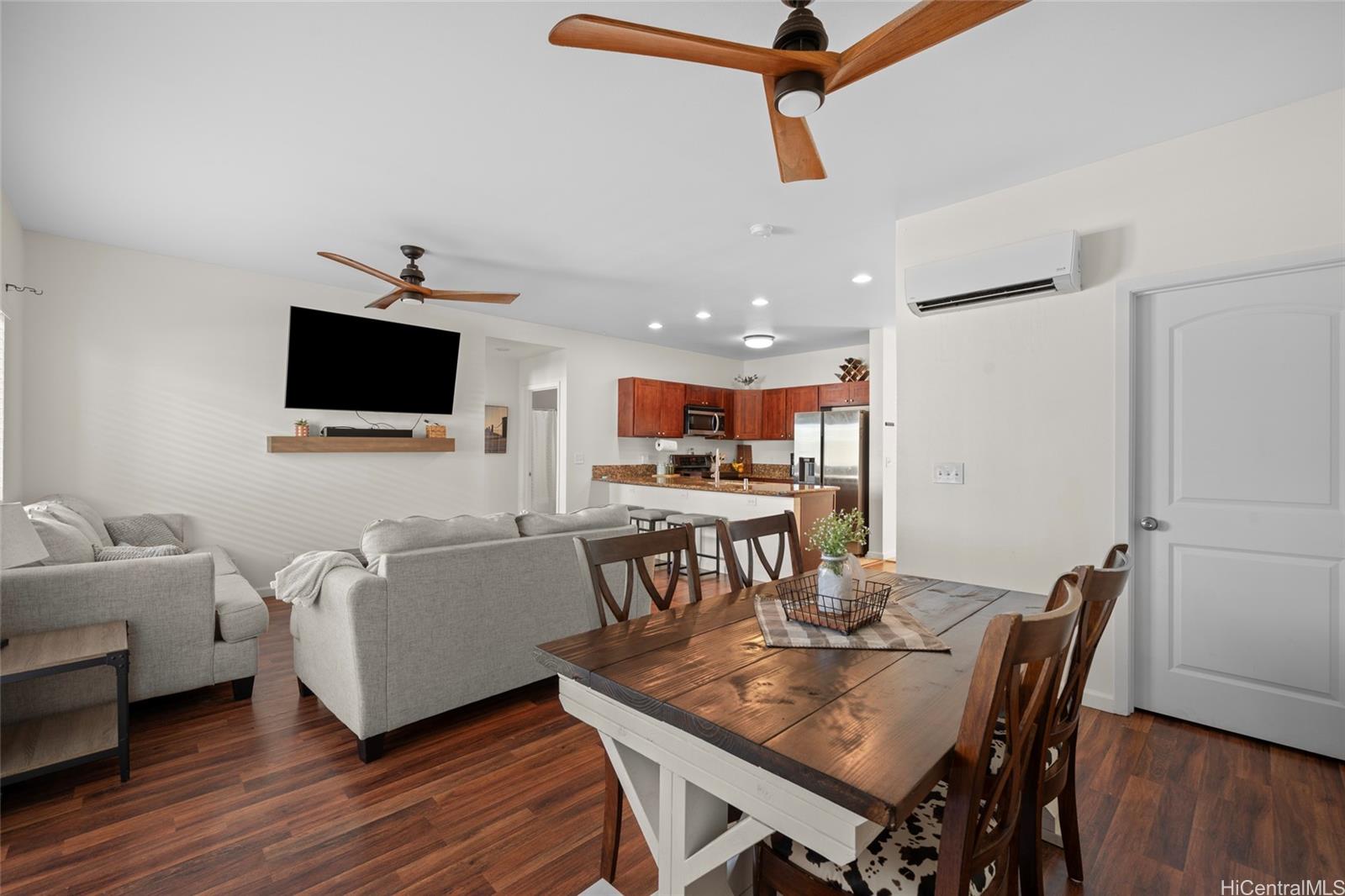 87-176 Maipalaoa Road, Unit D12 Waianae, HI 96792 - Photo 3 of 25 a view of a dining room with furniture and wooden floor