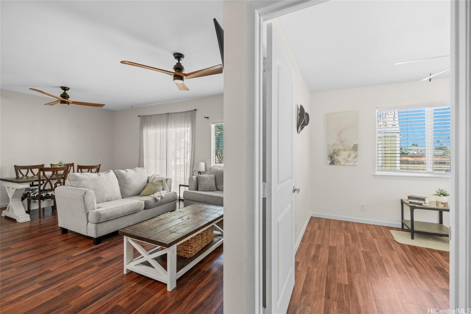 87-176 Maipalaoa Road, Unit D12 Waianae, HI 96792 - Photo 8 of 25 a living room with furniture and a wooden floor