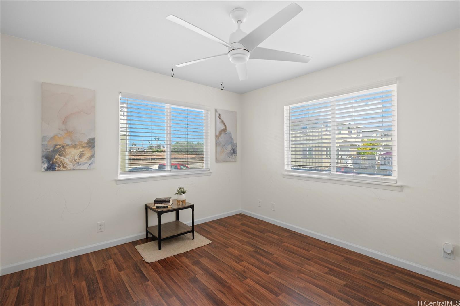 87-176 Maipalaoa Road, Unit D12 Waianae, HI 96792 - Photo 9 of 25 a room with window and wooden floor