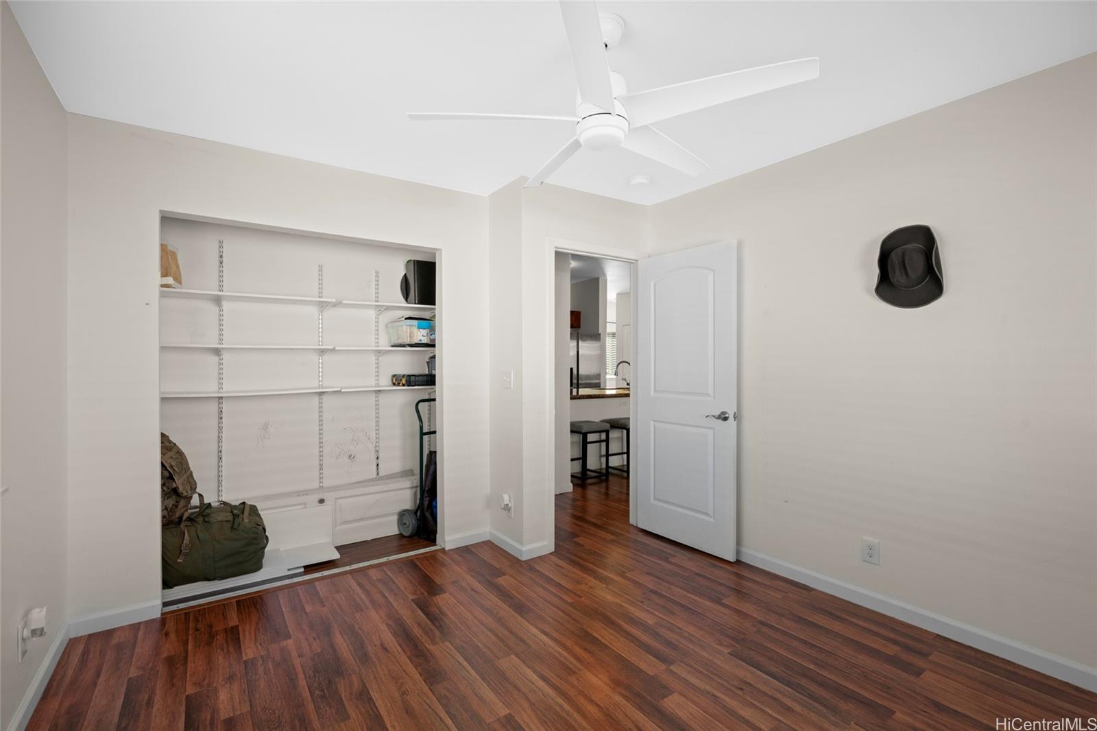 87-176 Maipalaoa Road, Unit D12 Waianae, HI 96792 - Photo 10 of 25 a view of empty room with wooden floor