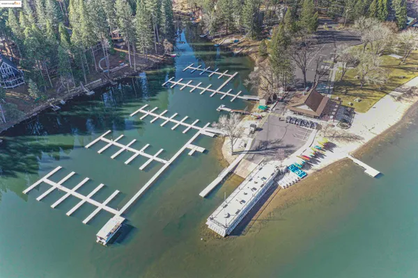 a view of a lake with a yard