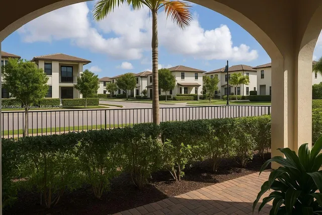 a view of a house and a yard