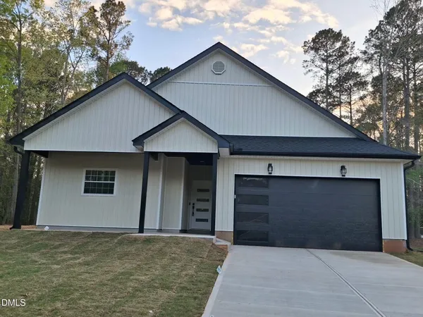 a front view of a house having yard