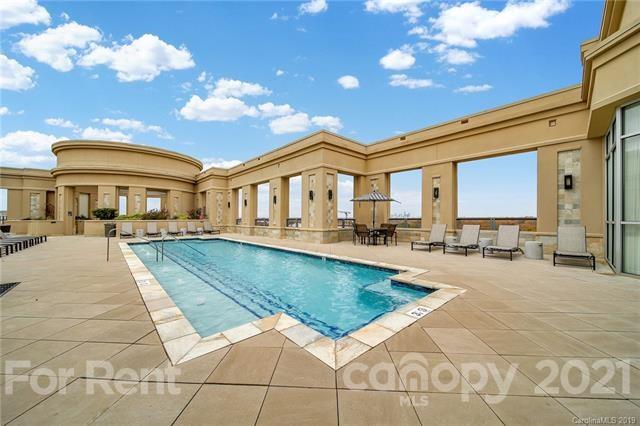 4300 Sharon Road, Unit 531 Charlotte, NC 28211 - Photo 3 of 10 a view of a house with swimming pool