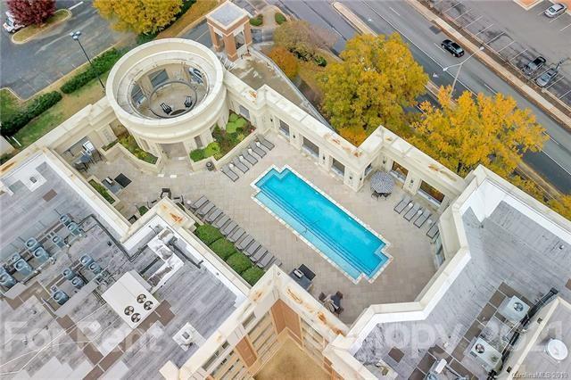 4300 Sharon Road, Unit 531 Charlotte, NC 28211 - Photo 6 of 10 aerial view of a house with a bed and a rug