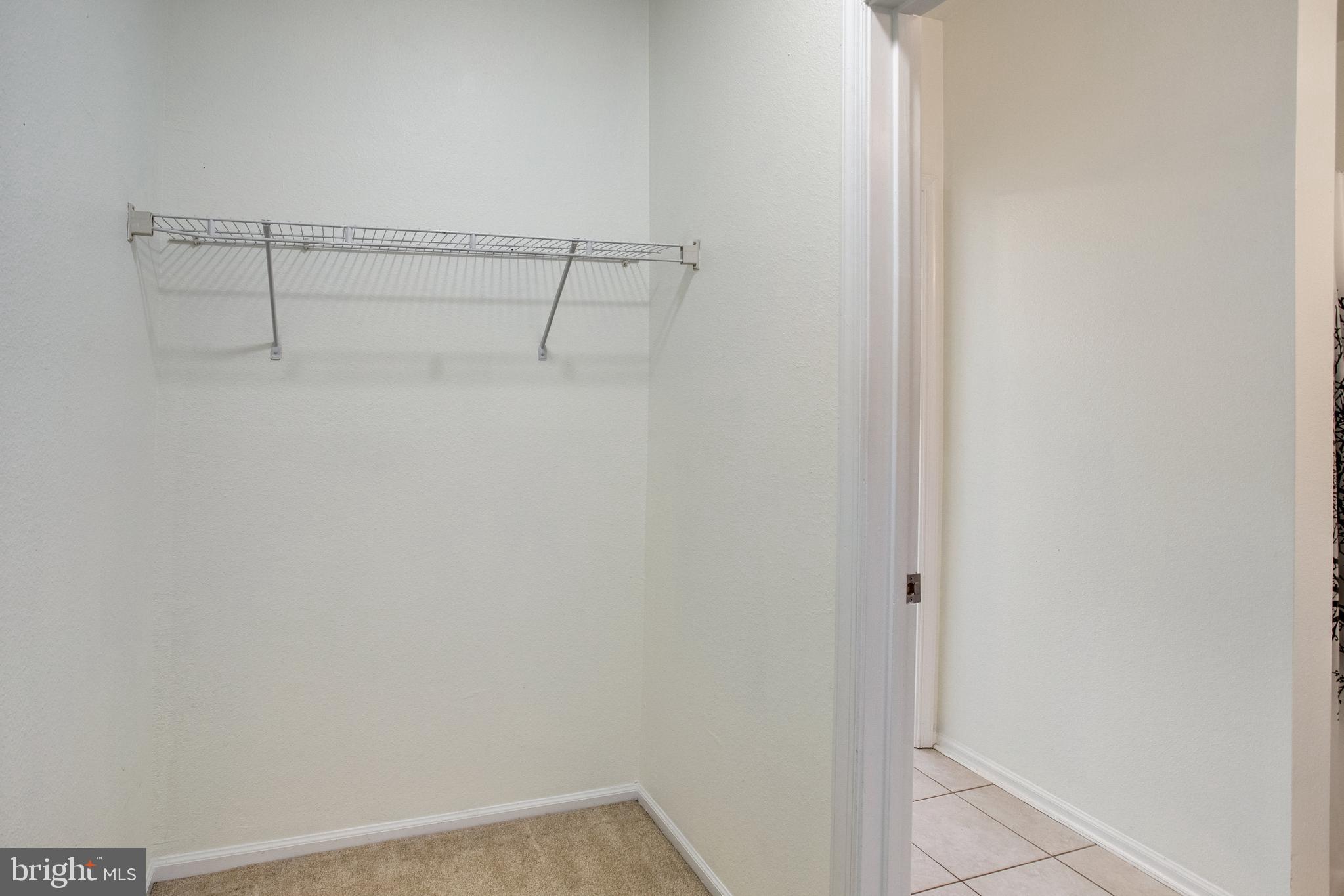 1530 Spring Gate Dr., Unit 9308 McLean, VA 22102 - Photo 19 of 38 a view of small space with racks on the wall