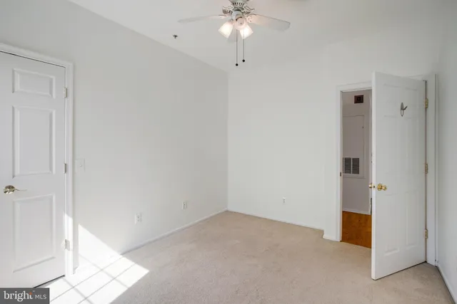 an empty room with a bathroom