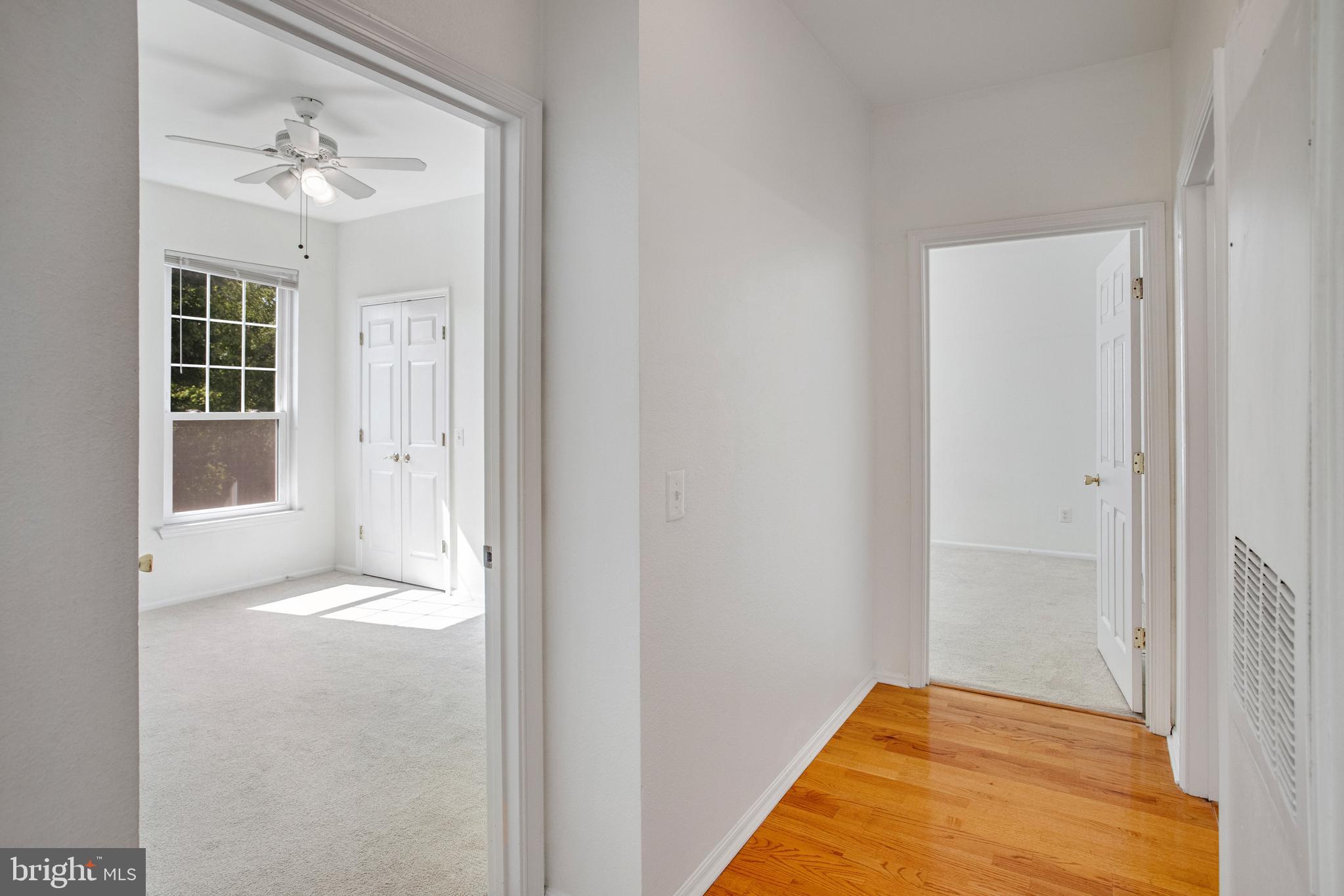 1530 Spring Gate Dr., Unit 9308 McLean, VA 22102 - Photo 23 of 38 a view of livingroom with hardwood floor and a ceiling fan