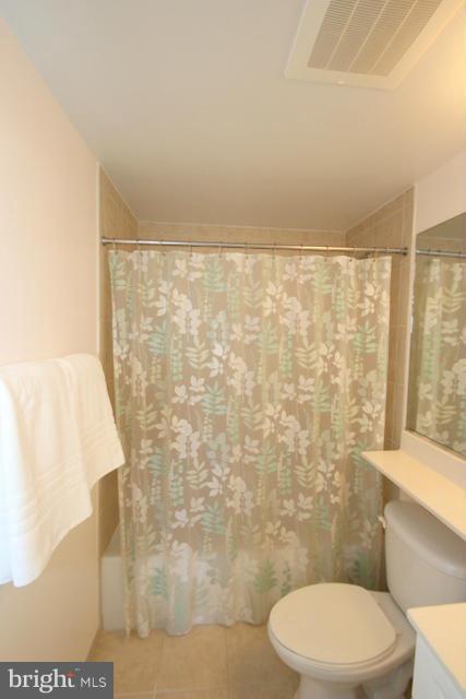 851 North Glebe Road, Unit 1311 Arlington, VA 22203 - Photo 15 of 30 a bathroom with a toilet and a shower