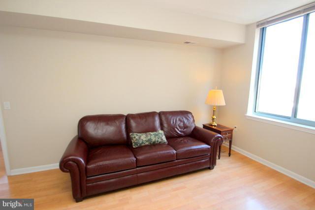 851 North Glebe Road, Unit 1311 Arlington, VA 22203 - Photo 18 of 30 a living room with furniture