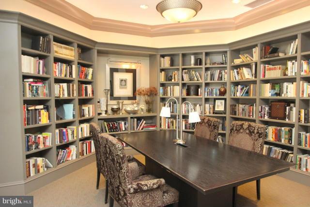 851 North Glebe Road, Unit 1311 Arlington, VA 22203 - Photo 25 of 30 a view of a dining room with furniture and book shelf