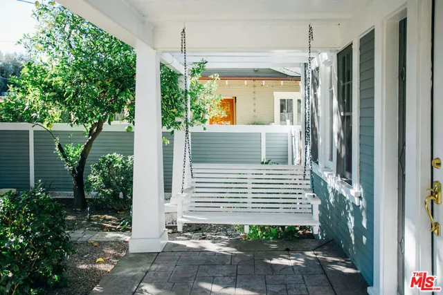 a kitchen with stainless steel appliances granite countertop a sink and a stove