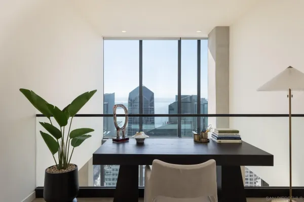 a bathroom with a shower sink and mirror