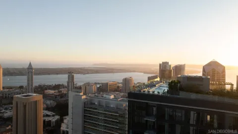 a view of a city with tall buildings
