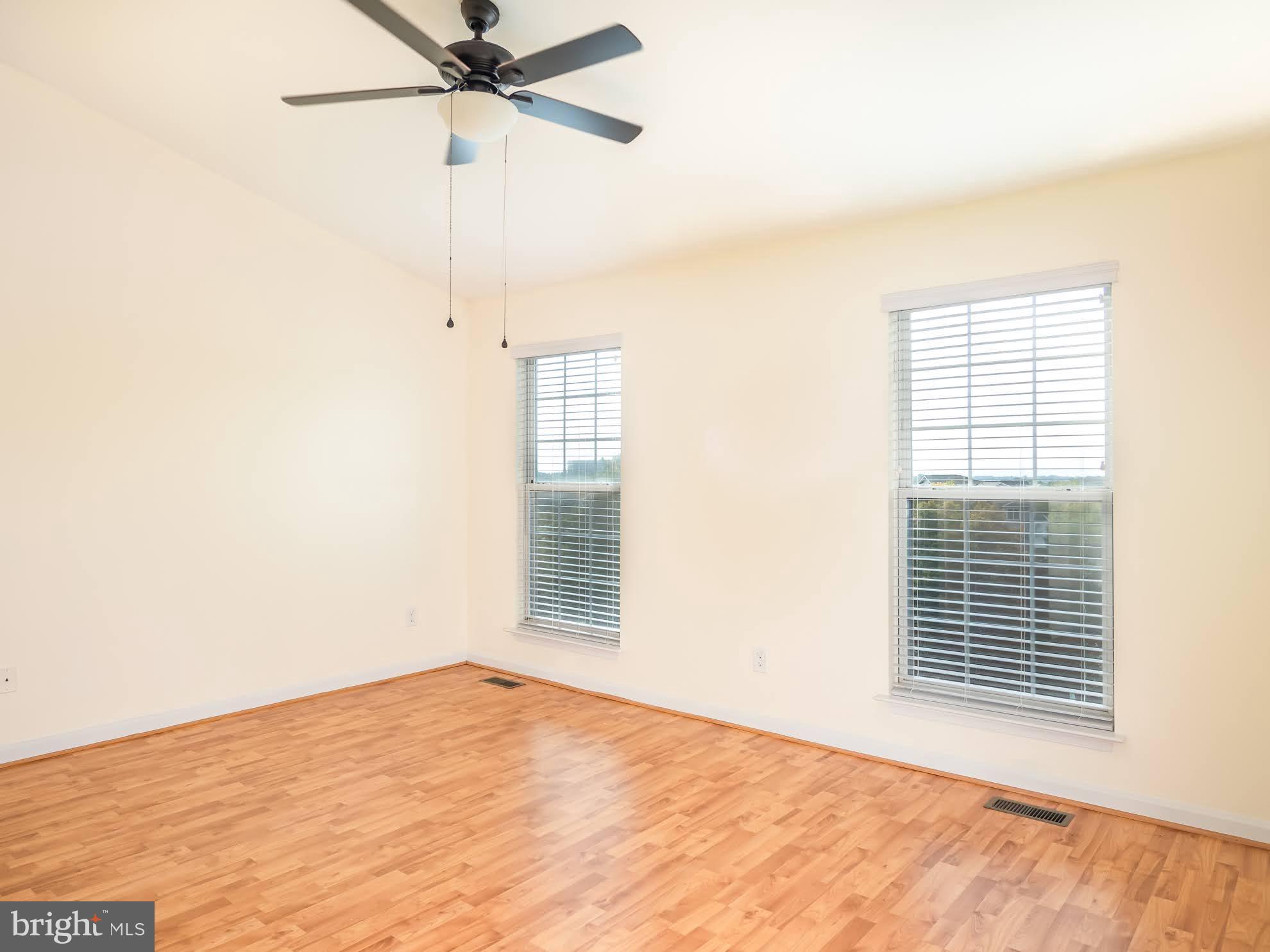 12755 Fair Crest Court, Unit 301 Fairfax, VA 22033 - Photo 12 of 24 a view of an empty room with a window
